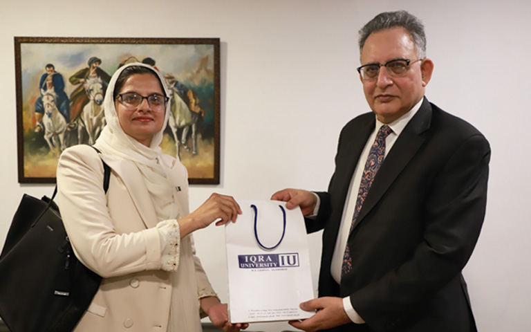 Ms. Tayaba Batool, CEO Capacity Analytics meeting Iqra University's Dean of Social Sciences, Professor Dr. Eatzaz Ahmad in Islamabad on November 11, 2024.