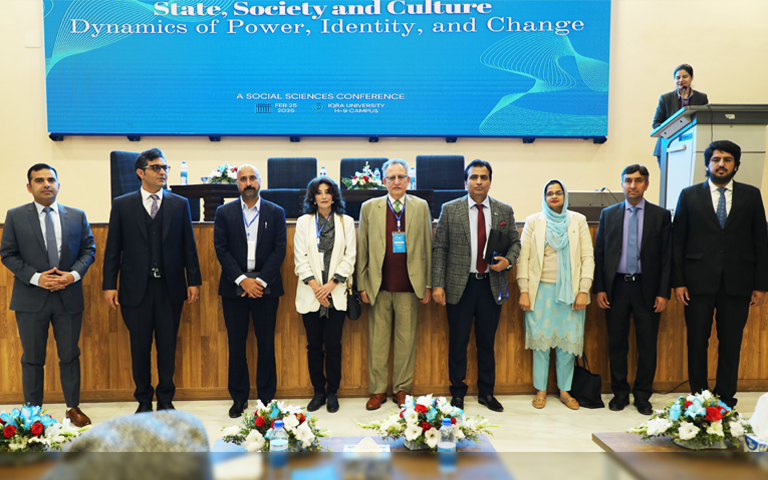 Organizers from Iqra University with panellists Ms. Aisha Khan, Mr. Asif Turangzai, Dr. Eatzaz Ahmad, Moderator Dr. Mutee ul Rehman, and CEO Capacity Analytics, Ms. Tayaba Batool at the Social Sciences Conference 2025.